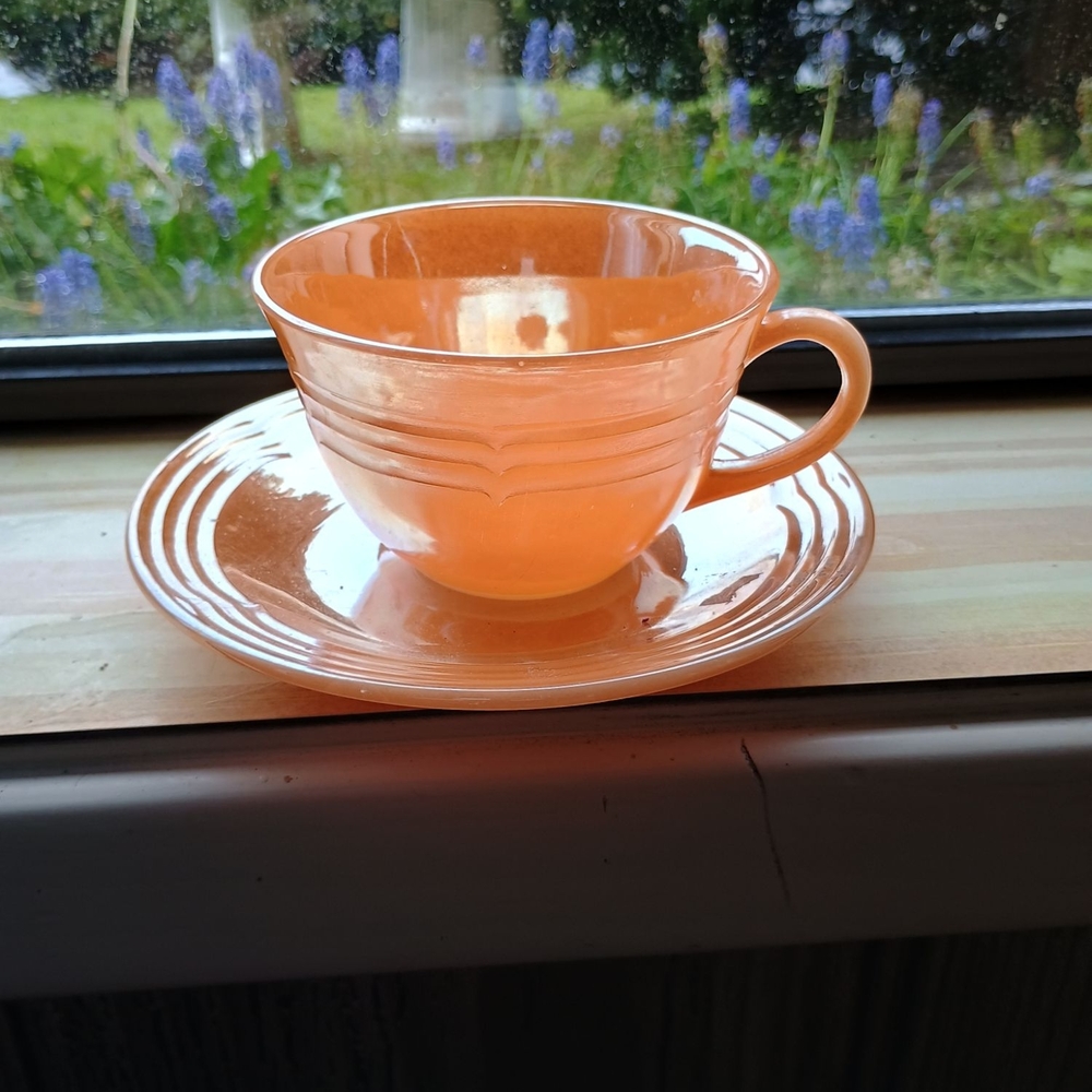 Orange Teacup and Saucer Set